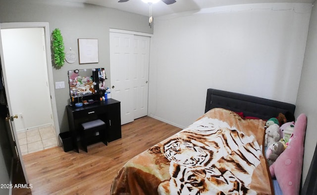 2809 N 107th Dr, Avondale, AZ 85392 - bedroom with a closet, light wood-style flooring, and a ceiling fan