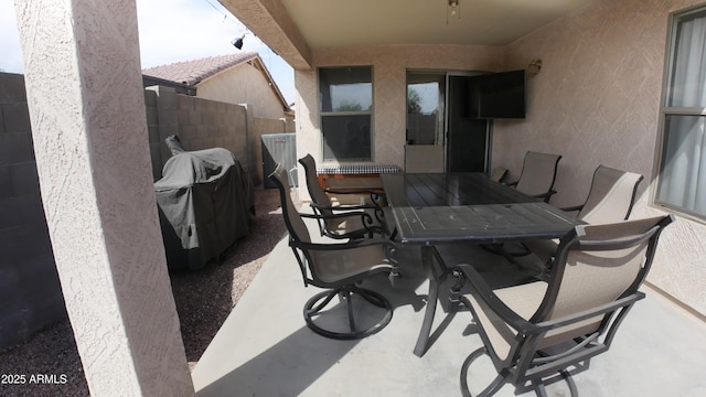 2809 N 107th Dr, Avondale, AZ 85392 - view of patio with outdoor dining space, area for grilling, and fence