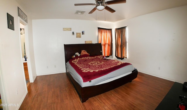 2809 N 107th Dr, Avondale, AZ 85392 - bedroom with wood finished floors, baseboards, ceiling fan, and visible vents