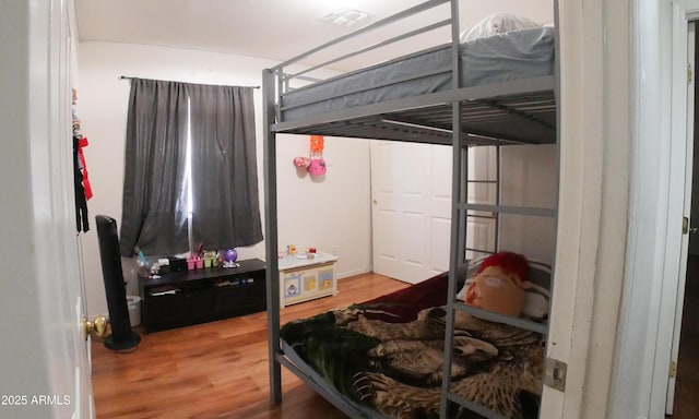 2809 N 107th Dr, Avondale, AZ 85392 - bedroom featuring visible vents and wood finished floors