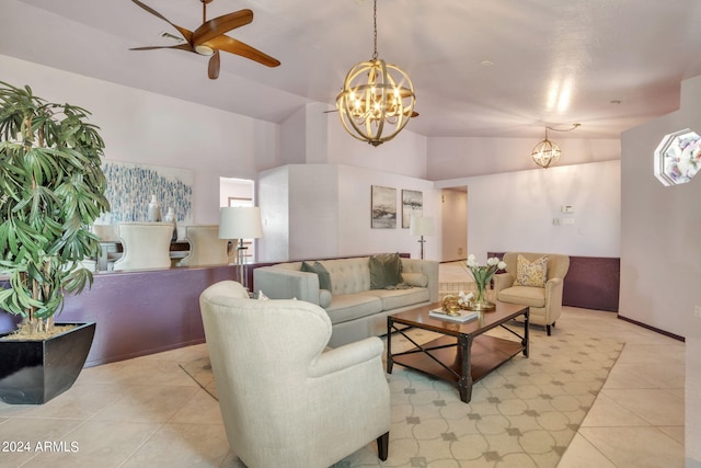 tiled living room with vaulted ceiling and ceiling fan with notable chandelier