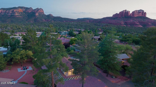 21 Hummingbird Cir, Sedona, AZ 86336 - aerial overview of property's location featuring a mountain backdrop and a forest