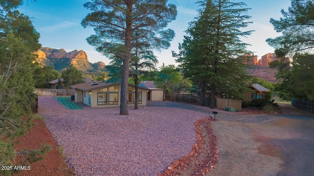 21 Hummingbird Cir, Sedona, AZ 86336 - view of front facade with a mountain view