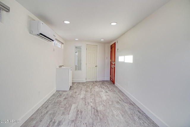 21 Hummingbird Cir, Sedona, AZ 86336 - spare room with a wall unit AC, light wood finished floors, baseboards, recessed lighting, and electric panel