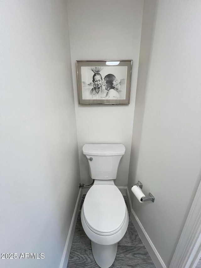 21 Hummingbird Cir, Sedona, AZ 86336 - bathroom with baseboards, toilet, and marble look tile flooring
