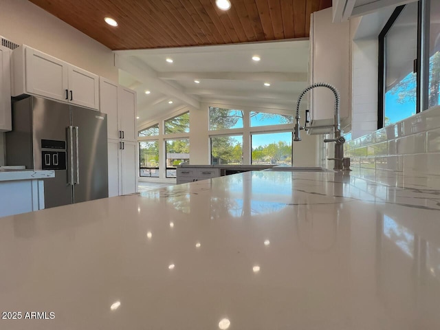 21 Hummingbird Cir, Sedona, AZ 86336 - kitchen featuring high end refrigerator, a sink, recessed lighting, and white cabinetry