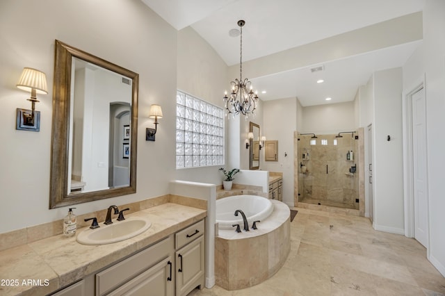 bathroom with lofted ceiling, vanity, independent shower and bath, and a notable chandelier