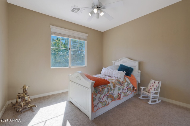 carpeted bedroom featuring ceiling fan