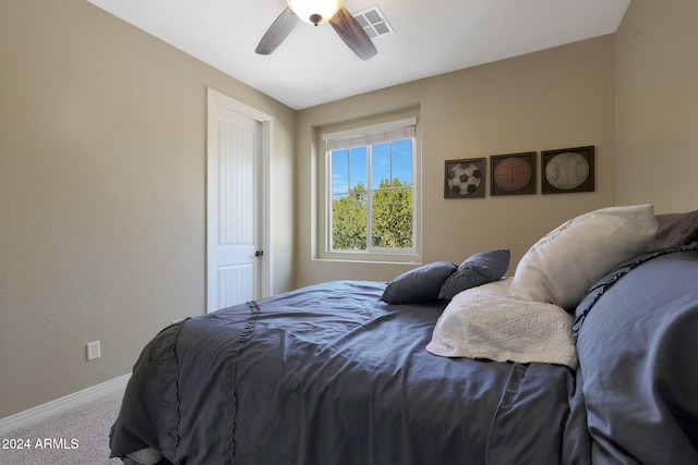 carpeted bedroom with ceiling fan