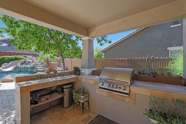 view of patio featuring area for grilling and grilling area