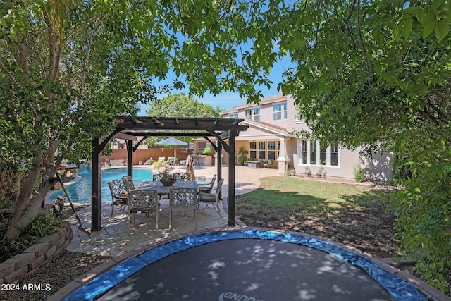 exterior space with a patio and a pergola