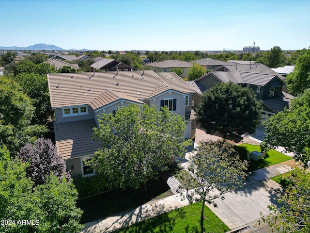 birds eye view of property featuring a mountain view