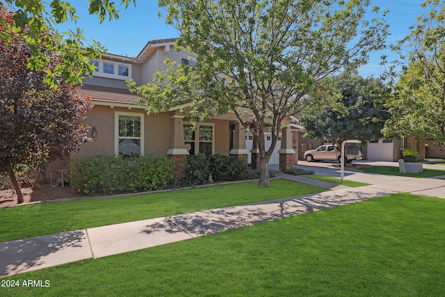 view of front facade with a front yard