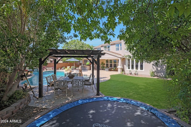 view of yard with a pergola and a patio