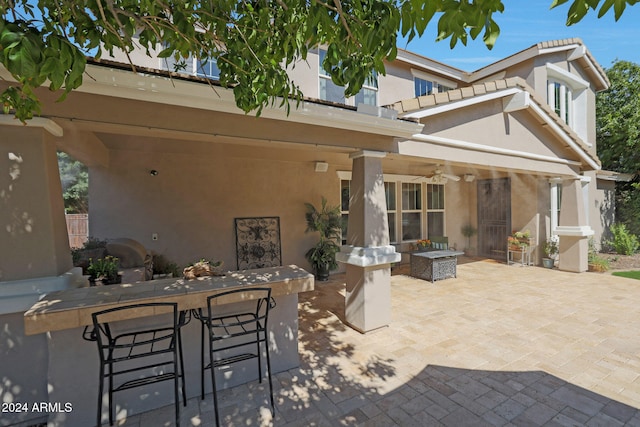 view of patio / terrace with ceiling fan