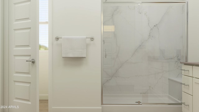 bathroom featuring vanity and walk in shower