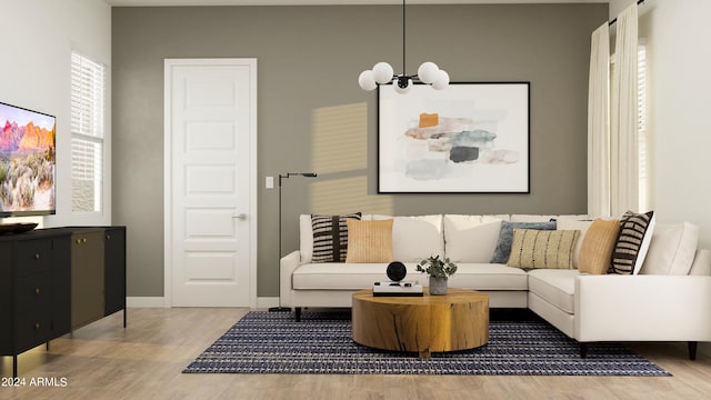 living room with a chandelier and hardwood / wood-style floors