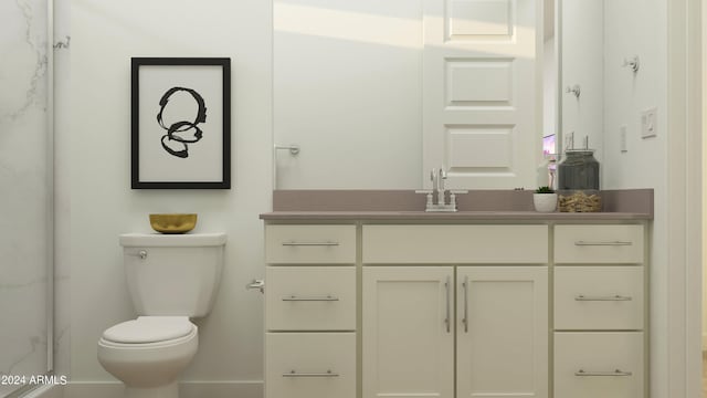 bathroom featuring toilet and vanity