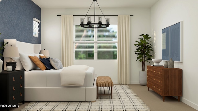 bedroom featuring an inviting chandelier