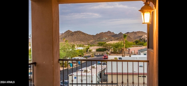 balcony featuring a mountain view