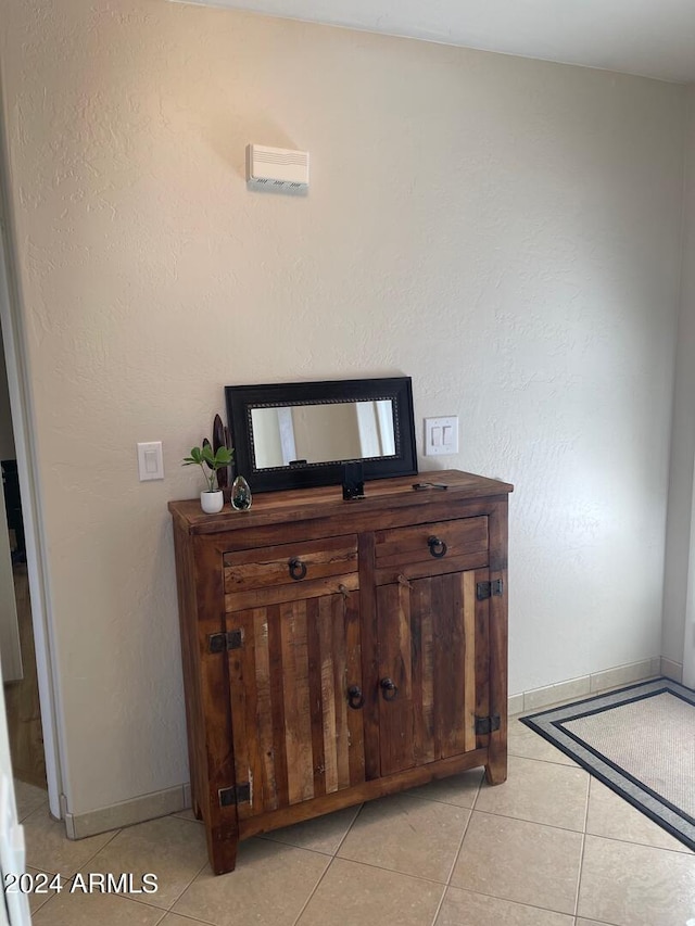 room details with vanity and light tile floors