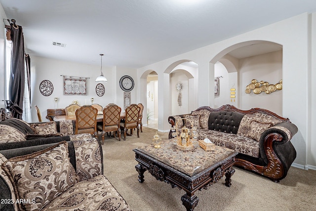 living room featuring light colored carpet