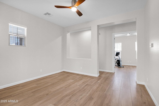 20115 E Sonoqui Blvd E, Queen Creek, AZ 85142 - unfurnished room featuring a ceiling fan and light wood-style floors