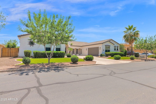 20115 E Sonoqui Blvd E, Queen Creek, AZ 85142 - mediterranean / spanish-style house with a garage, a tile roof, and stucco siding