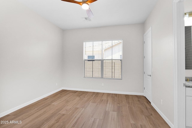 20115 E Sonoqui Blvd E, Queen Creek, AZ 85142 - spare room with light wood-style flooring and ceiling fan