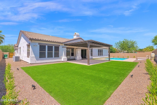 20115 E Sonoqui Blvd E, Queen Creek, AZ 85142 - rear view of house with a fenced backyard, a patio, a chimney, stucco siding, and a tiled roof