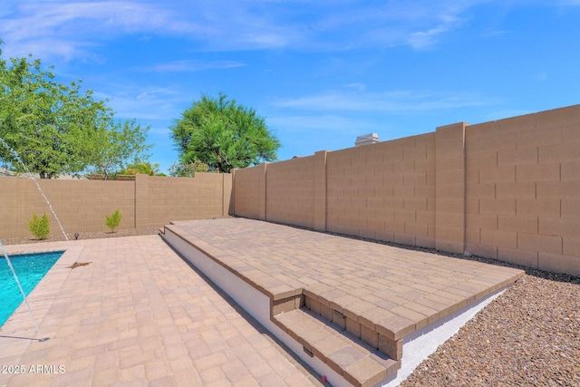 20115 E Sonoqui Blvd E, Queen Creek, AZ 85142 - fenced backyard featuring a patio