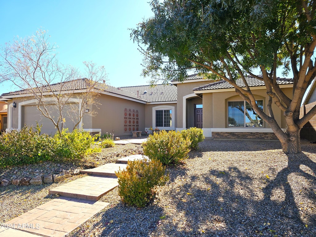 view of front of property with a garage