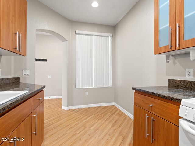 bathroom with tile patterned flooring, vanity, and ceiling fan