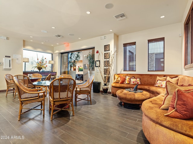 dining space with hardwood / wood-style flooring