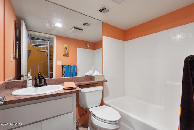 full bathroom with shower / bathing tub combination, vanity, and toilet