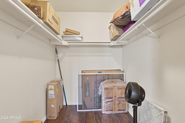 walk in closet featuring dark hardwood / wood-style floors