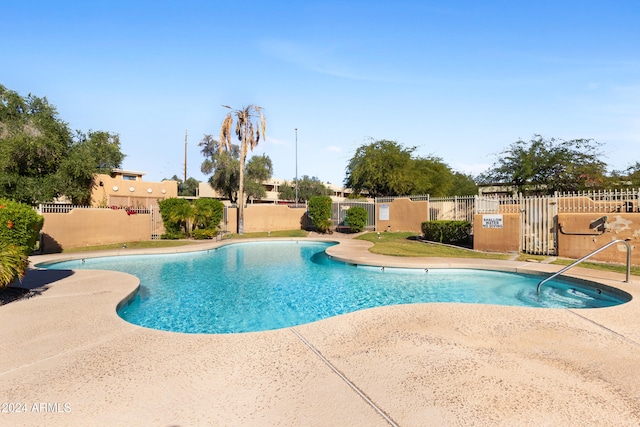 view of pool featuring a patio