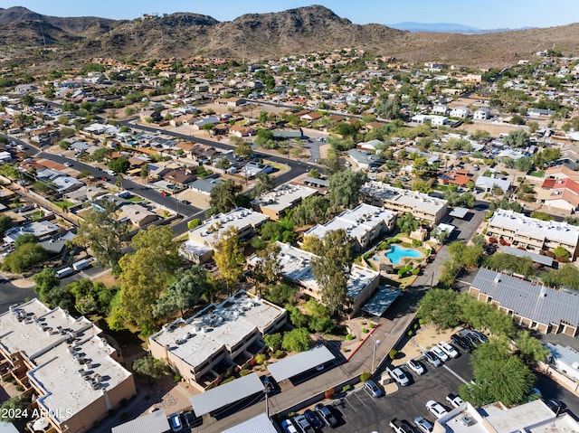 birds eye view of property featuring a mountain view