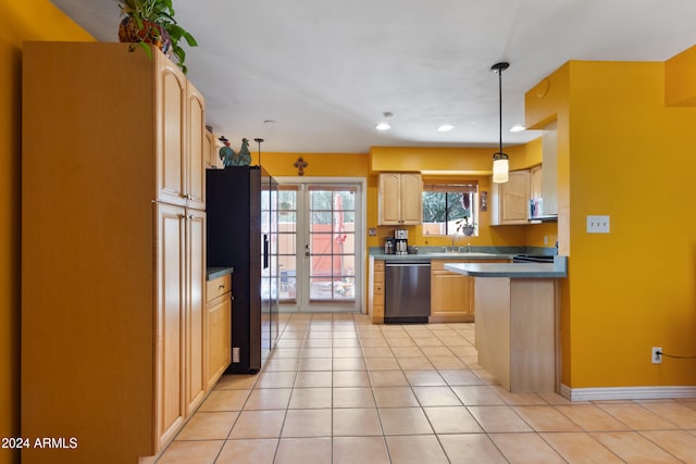 kitchen featuring light tile patterned floors, black refrigerator, light brown cabinets, pendant lighting, and dishwasher