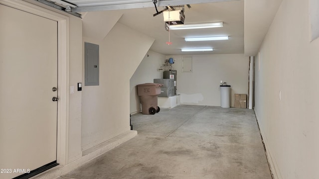 9551 E Redfield Rd Unit 1061, Scottsdale, AZ 85260 - garage featuring electric panel, a garage door opener, and electric water heater