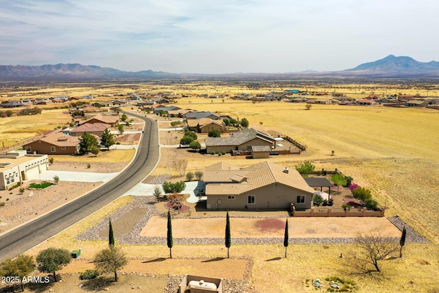 drone / aerial view featuring a mountain view