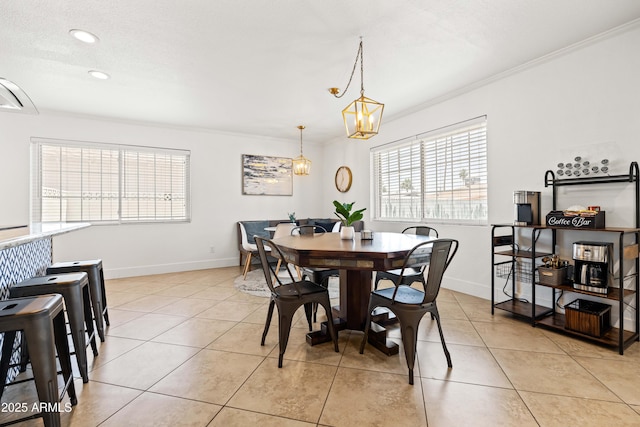 8315 E Devonshire Ave, Scottsdale, AZ 85251 - dining room featuring light tile patterned floors, crown molding, baseboards, a chandelier, and recessed lighting