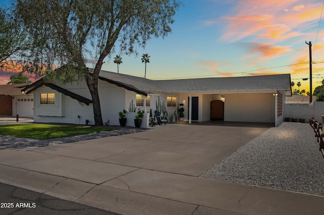 8315 E Devonshire Ave, Scottsdale, AZ 85251 - single story home with driveway, a yard, and an attached carport