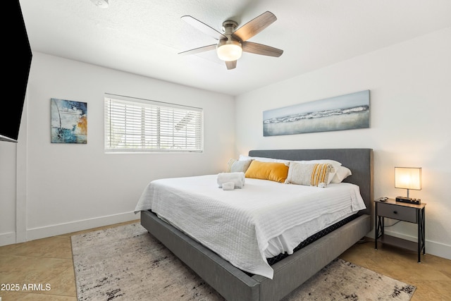 8315 E Devonshire Ave, Scottsdale, AZ 85251 - bedroom with baseboards, ceiling fan, and tile patterned floors