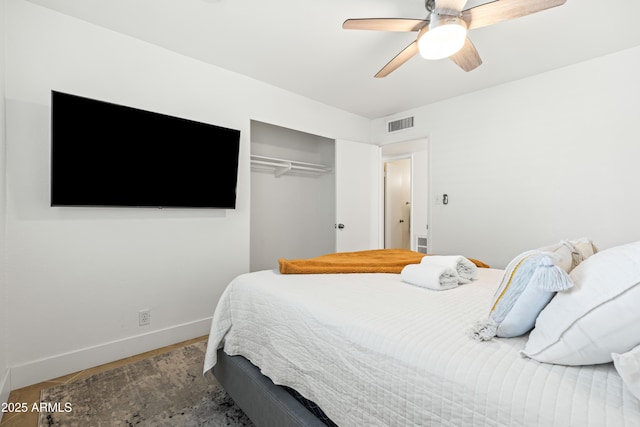 8315 E Devonshire Ave, Scottsdale, AZ 85251 - bedroom with a closet, baseboards, and a ceiling fan
