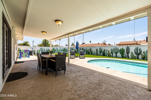 8315 E Devonshire Ave, Scottsdale, AZ 85251 - view of pool featuring a patio area, a fenced backyard, and outdoor dining area