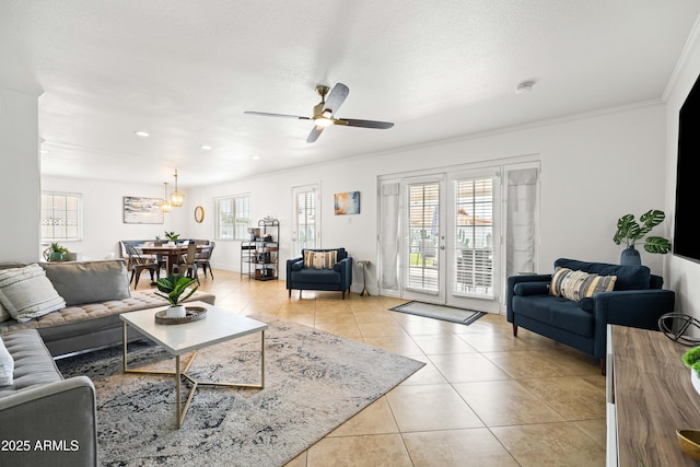 8315 E Devonshire Ave, Scottsdale, AZ 85251 - living room featuring light tile patterned flooring, a ceiling fan, crown molding, and recessed lighting