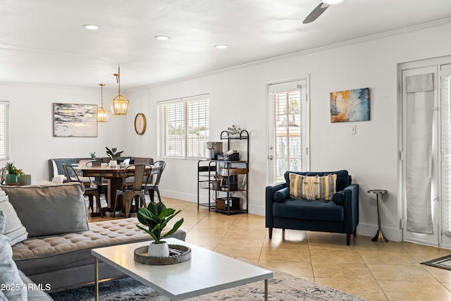 8315 E Devonshire Ave, Scottsdale, AZ 85251 - living area with ornamental molding, light tile patterned floors, a chandelier, baseboards, and ceiling fan
