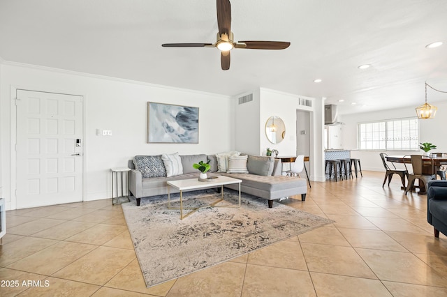 8315 E Devonshire Ave, Scottsdale, AZ 85251 - living area featuring light tile patterned floors, a ceiling fan, crown molding, recessed lighting, and baseboards