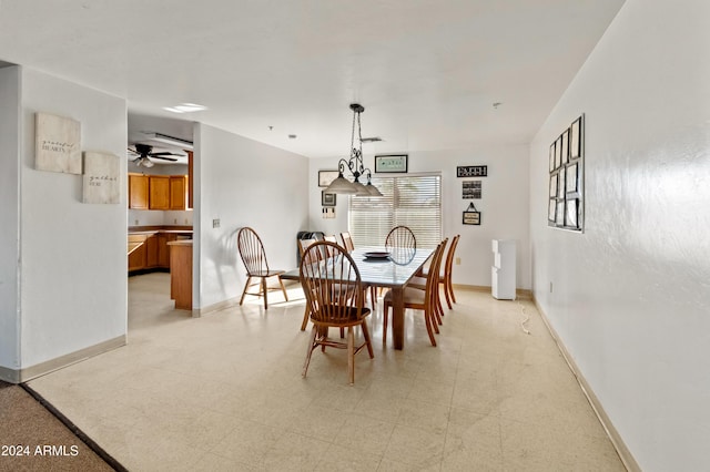 dining room featuring ceiling fan